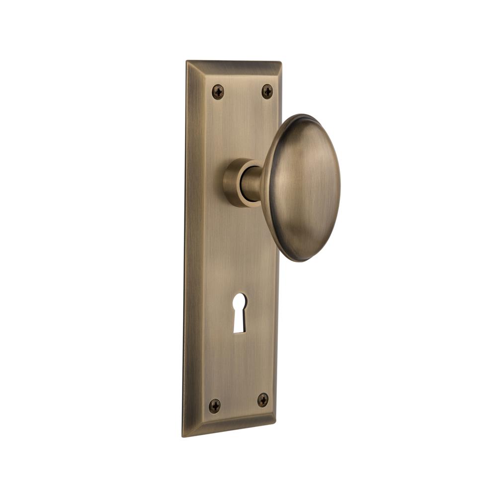 Nostalgic Warehouse NYKHOM Mortise New York Plate with Homestead Knob and Keyhole in Antique Brass
